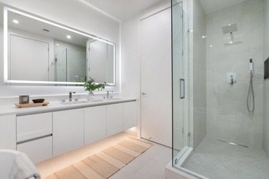 This gorgeous new construction waterfront condo offers bright - photo 9