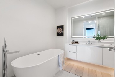 This gorgeous new construction waterfront condo offers bright - photo 10