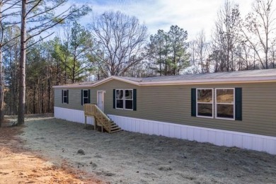 Lake Home For Sale in Como, Mississippi