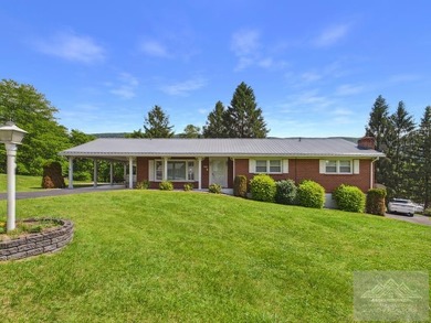 Welcome to this spacious and well maintained brick ranch home - photo 1