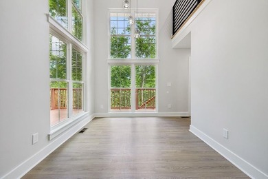 Nestled among mature trees in a desirable Center Hill Lake gated - photo 11