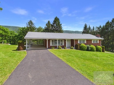 Welcome to this spacious and well maintained brick ranch home - photo 2