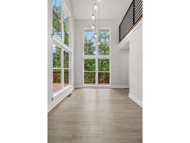 Nestled among mature trees in a desirable Center Hill Lake gated - photo 12