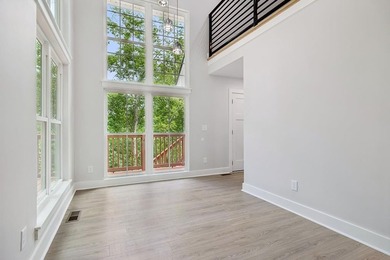 Nestled among mature trees in a desirable Center Hill Lake gated - photo 13