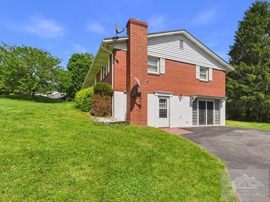 Welcome to this spacious and well maintained brick ranch home - photo 5