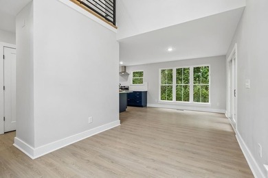 Nestled among mature trees in a desirable Center Hill Lake gated - photo 15