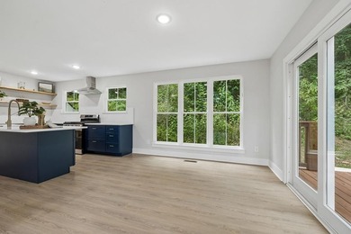 Nestled among mature trees in a desirable Center Hill Lake gated - photo 16