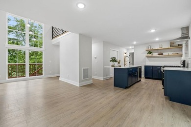 Nestled among mature trees in a desirable Center Hill Lake gated - photo 17