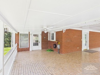 Welcome to this spacious and well maintained brick ranch home - photo 8