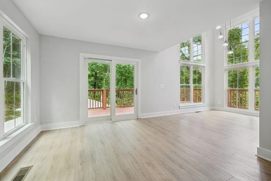 Nestled among mature trees in a desirable Center Hill Lake gated - photo 18