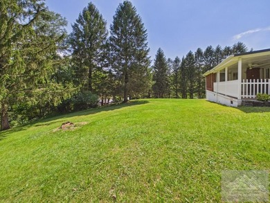 Welcome to this spacious and well maintained brick ranch home - photo 10