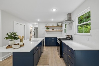 Nestled among mature trees in a desirable Center Hill Lake gated - photo 20