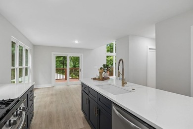 Nestled among mature trees in a desirable Center Hill Lake gated - photo 23