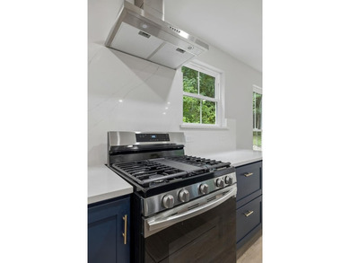 Nestled among mature trees in a desirable Center Hill Lake gated - photo 24