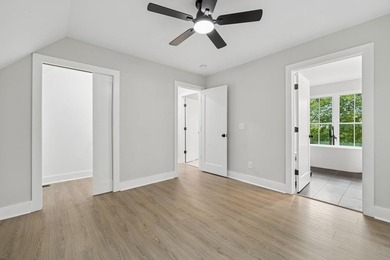 Nestled among mature trees in a desirable Center Hill Lake gated - photo 27