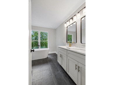 Nestled among mature trees in a desirable Center Hill Lake gated - photo 29