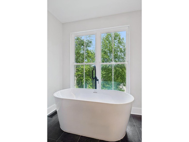 Nestled among mature trees in a desirable Center Hill Lake gated - photo 32
