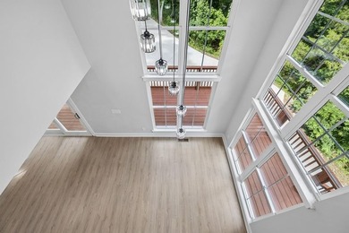 Nestled among mature trees in a desirable Center Hill Lake gated - photo 35