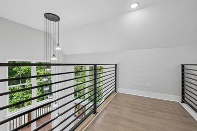 Nestled among mature trees in a desirable Center Hill Lake gated - photo 36