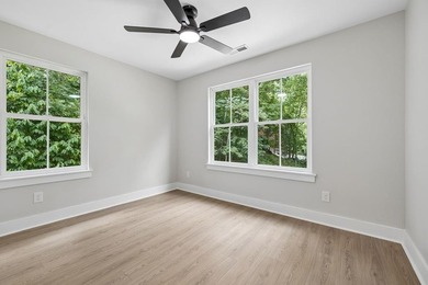Nestled among mature trees in a desirable Center Hill Lake gated - photo 37