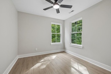 Nestled among mature trees in a desirable Center Hill Lake gated - photo 41
