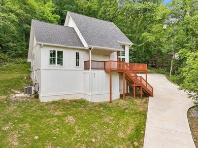 Nestled among mature trees in a desirable Center Hill Lake gated - photo 48