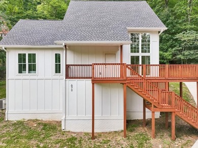 Nestled among mature trees in a desirable Center Hill Lake gated - photo 49