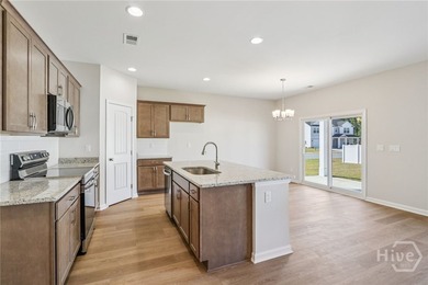 The Magnolia floorplan by Smith Family Homes is under - photo 5