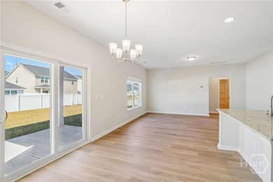 The Magnolia floorplan by Smith Family Homes is under - photo 10
