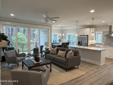 The Ivy home plan in the charming Cottage Elevation graces the - photo 3