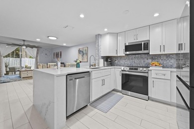 Welcome home to this beautifully remodeled 3-bedroom, 2.5-bath - photo 1