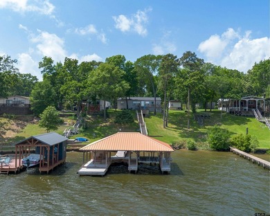 Enjoy a front-row seat to Lake Palestine from this three-bedroom - photo 29