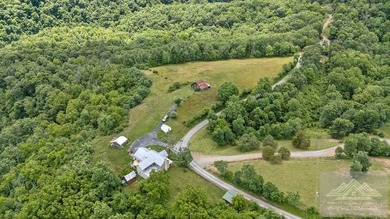 Nestled on 17 breathtaking acres, this enchanting 1910 farmhouse - photo 2
