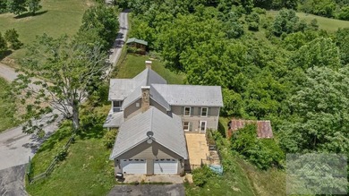 Nestled on 17 breathtaking acres, this enchanting 1910 farmhouse - photo 5