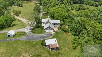 Nestled on 17 breathtaking acres, this enchanting 1910 farmhouse - photo 6