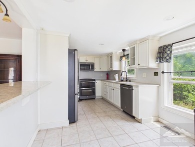 Nestled on 17 breathtaking acres, this enchanting 1910 farmhouse - photo 10