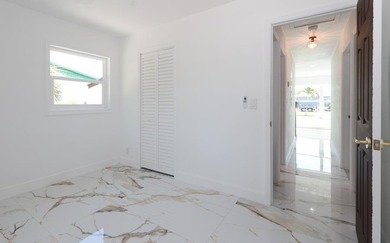 Step into a home where *renovated* is an understatement-it's - photo 13