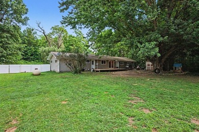 Nestled on 2 beautiful acres, this spacious ranch offers the - photo 20