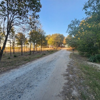 Wooded corner lot available in a lakefront community on Lake - photo 4