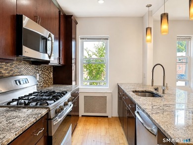 Enjoy effortless living in this sun-filled one-bedroom, one-bath - photo 5
