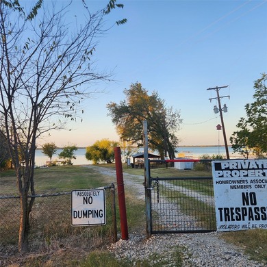 Wooded corner lot available in a lakefront community on Lake - photo 8