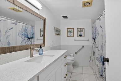This spacious 2/2 ground-floor condo offers the perfect blend of - photo 14