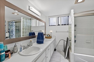 This spacious 2/2 ground-floor condo offers the perfect blend of - photo 18