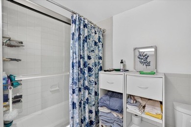 This spacious 2/2 ground-floor condo offers the perfect blend of - photo 19