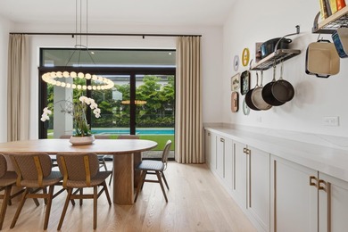 Welcome to a custom-designed turnkey Riverside model in the - photo 26