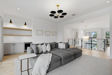 Welcome to a custom-designed turnkey Riverside model in the - photo 43