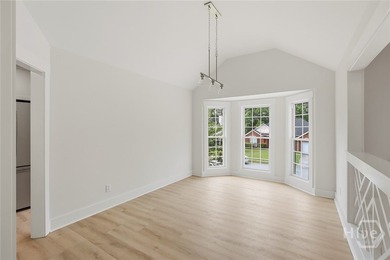 Completely updated and move-in ready, this stunning 5-bedroom - photo 4