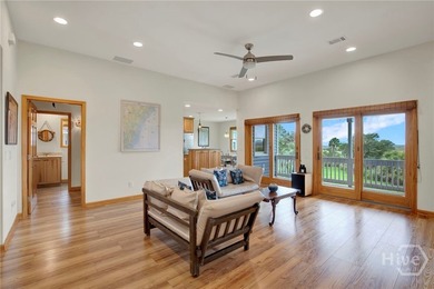 This custom-built coastal cottage sits on a scenic bluff - photo 8