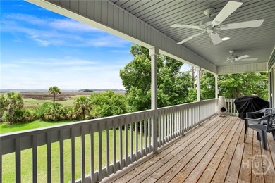 This custom-built coastal cottage sits on a scenic bluff - photo 10