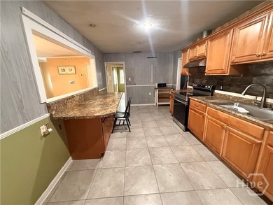 Unlock the potential of this unique property featuring a - photo 4